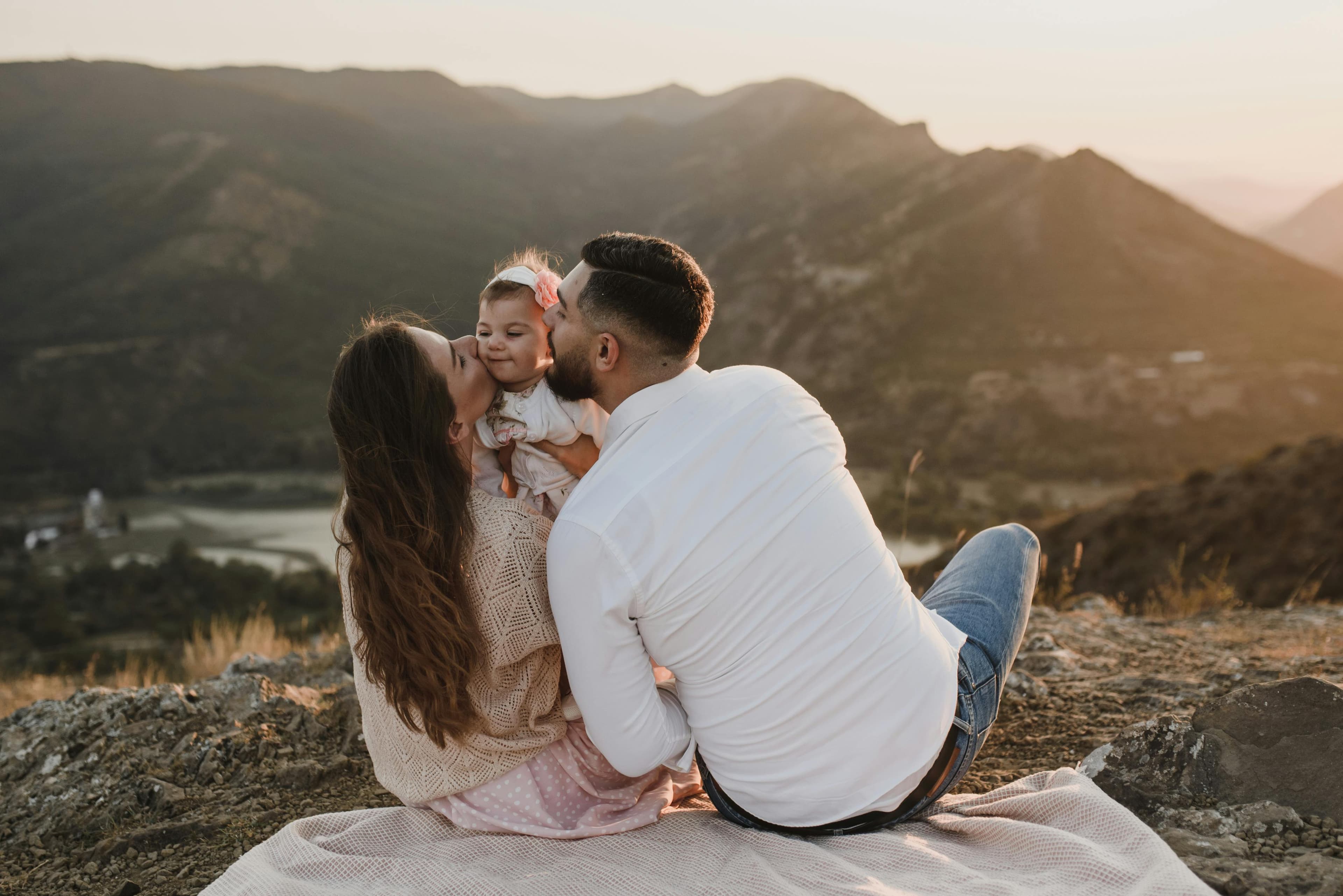 Young family sharing a quiet moment outdoors